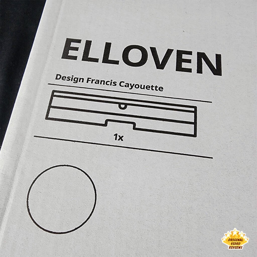 Close-up of the IKEA ELLOVEN monitor stand packaging, showing the product name and simple line illustration on the box.