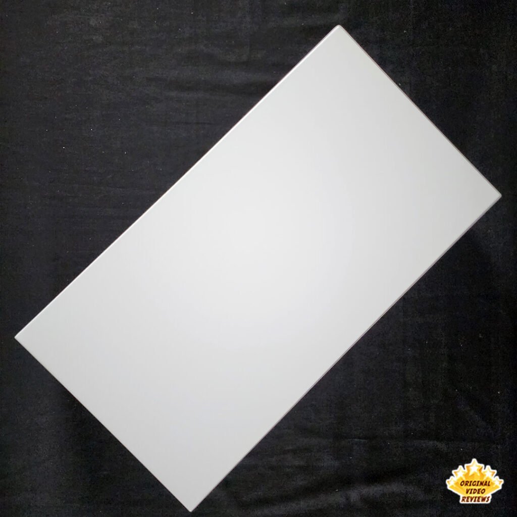 Top view of the IKEA ELLOVEN Monitor Stand with Drawer, photographed diagonally to show the smooth white surface.