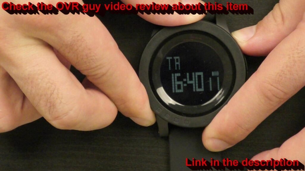 OVR Guy turning the outer jog of the SKMEI 1142 wristwatch, which makes a clicking sound but has no function.