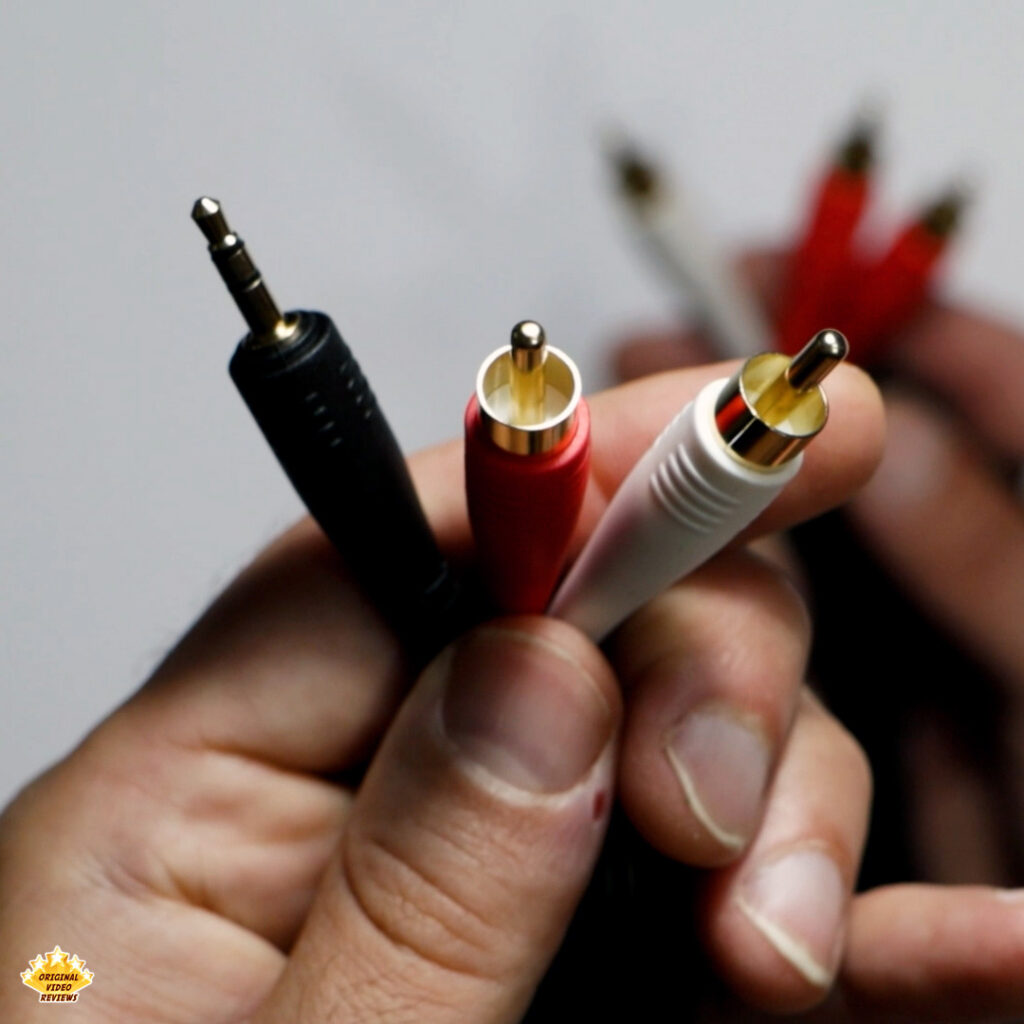 Close-up of the RCA and AUX connectors on the Edifier T5 subwoofer cable – featured in the OVR review