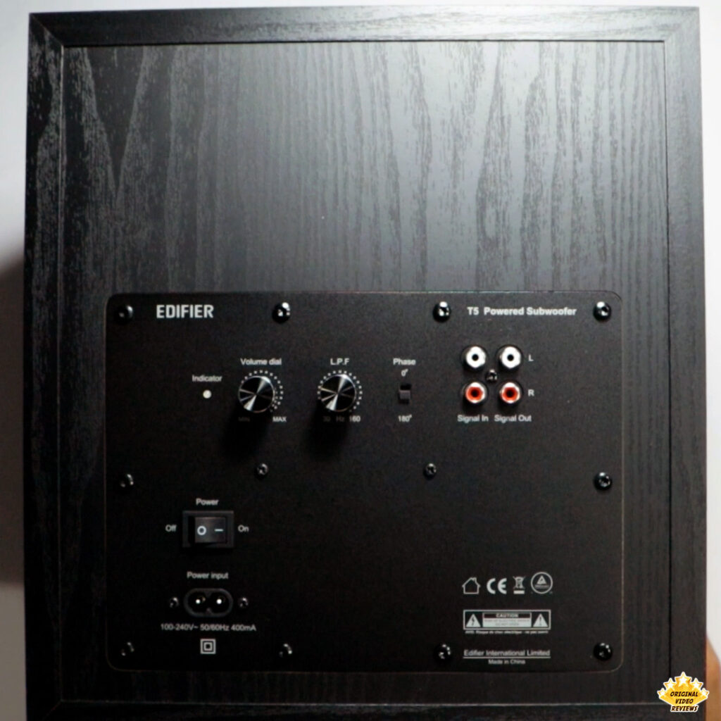 Rear panel of the Edifier T5 subwoofer showing volume, LPF, phase controls, and RCA inputs/outputs – from the OVR review