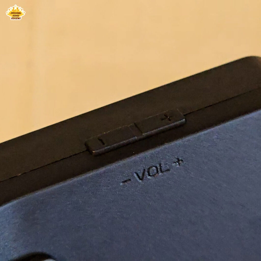 Close-up of the volume control buttons on the X6 handheld gaming console
