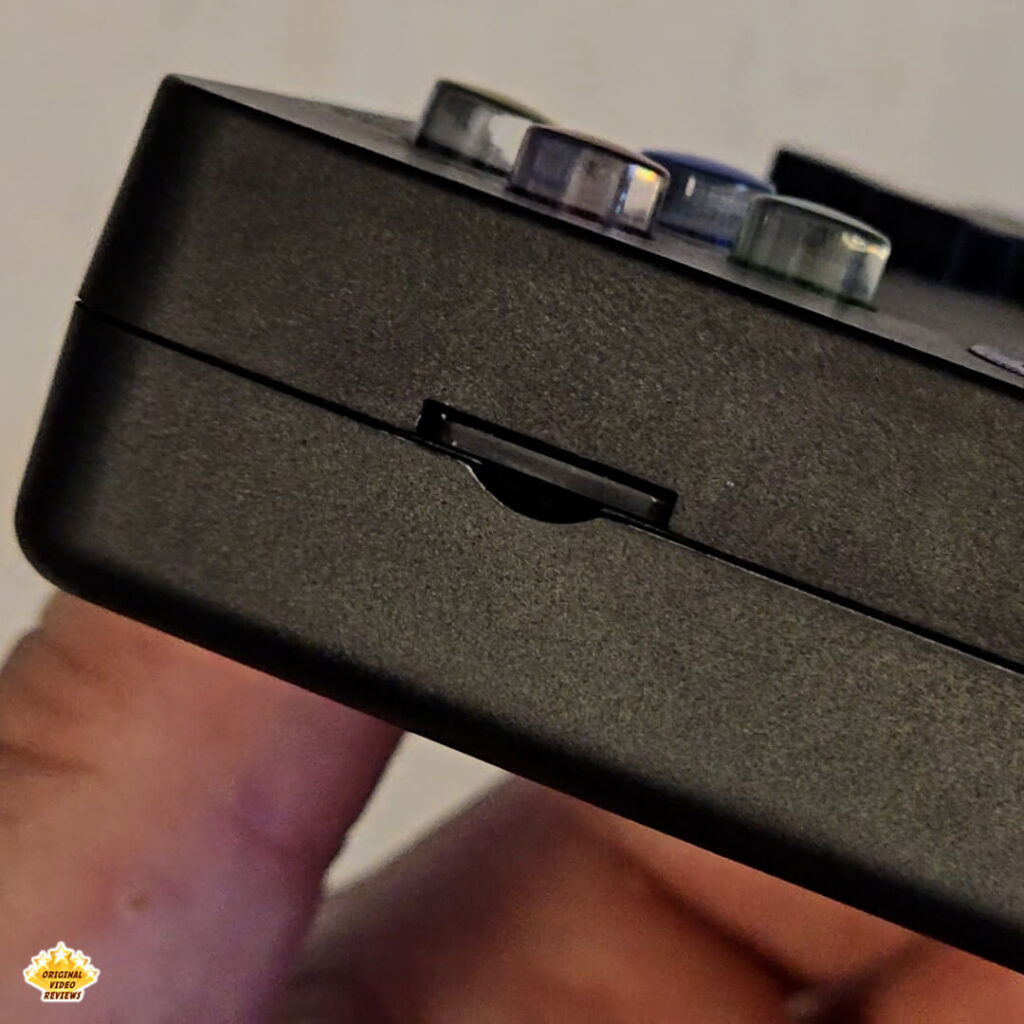 Close-up of the microSD card slot on the X6 handheld gaming console