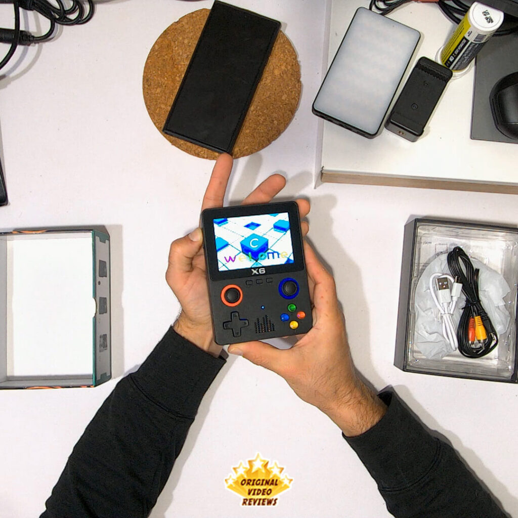 Unboxing and powering on the X6 handheld retro gaming console