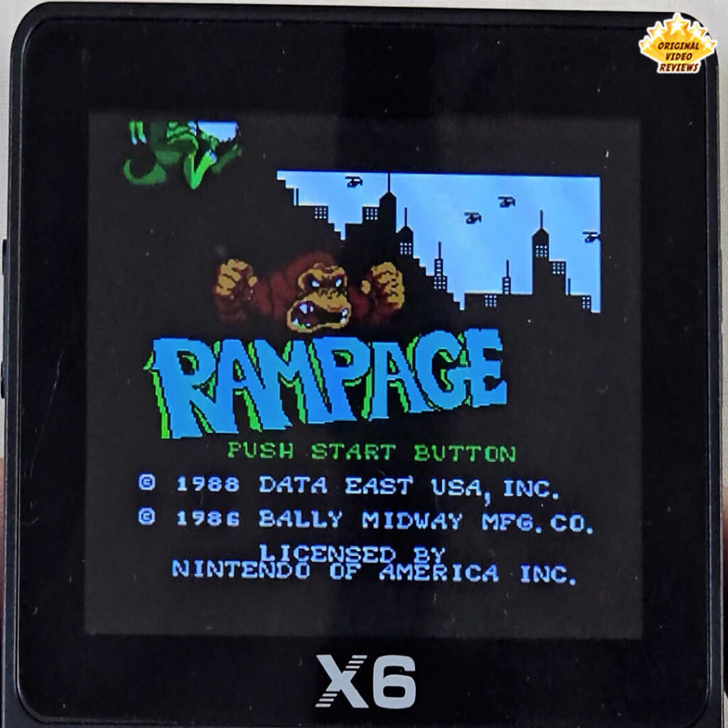X6 handheld console displaying the title screen of Rampage by Data East USA and Bally Midway (1988), licensed by Nintendo of America.