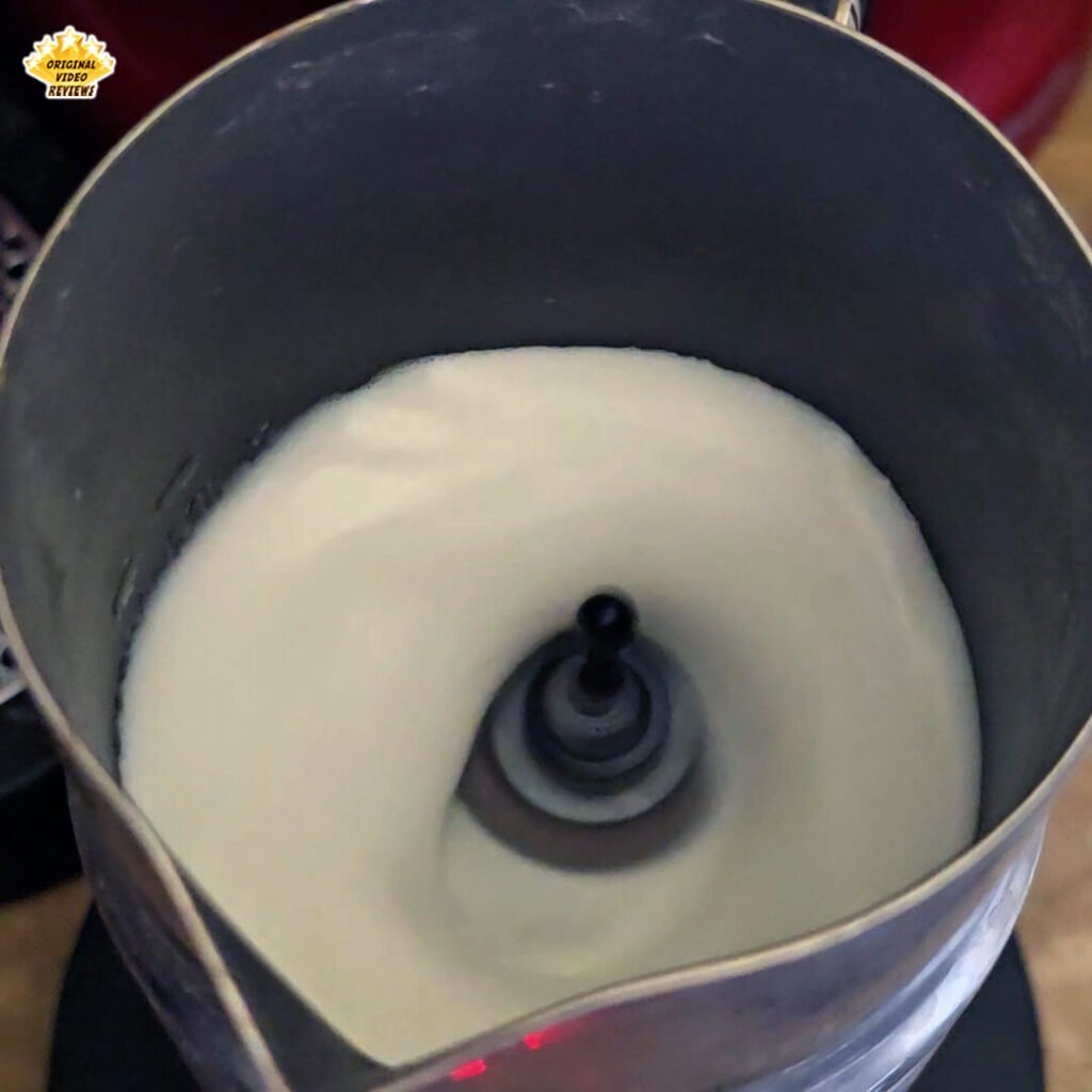 Frothing milk in a Nespresso Aeroccino 4 milk frother, creating a smooth foam for a cappuccino or latte macchiato as part of The OVR Guy’s Bristot Classico Oro coffee review.