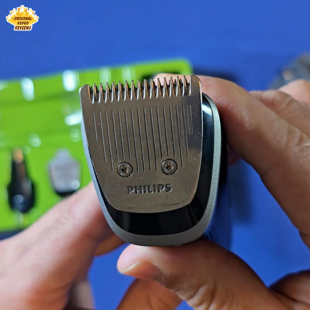 Close-up view of the standard metal trimmer head on the Philips Norelco Multigroom 5000 MG5970/49.