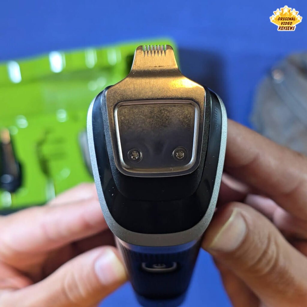 Close-up of the Philips Norelco Multigroom 5000 MG5970/49 with the precision metal trimmer head attached.