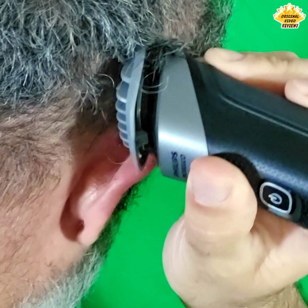 The OVR Guy trims his hair around the ear using the Philips Norelco Multigroom 5000 equipped with the gray 4 mm hair guard attachment.