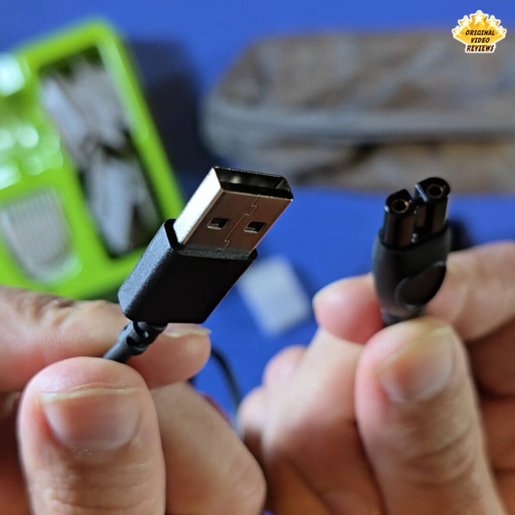 Close-up of the USB charging cable included with the Philips Norelco Multigroom 5000 (model MG5970/49), shown during The OVR Guy’s review.