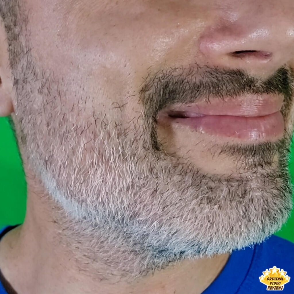 Close-up of The OVR Guy smiling at the camera, showing his well-groomed beard after using the Philips Norelco Multigroom 5000 (MG5970/49).