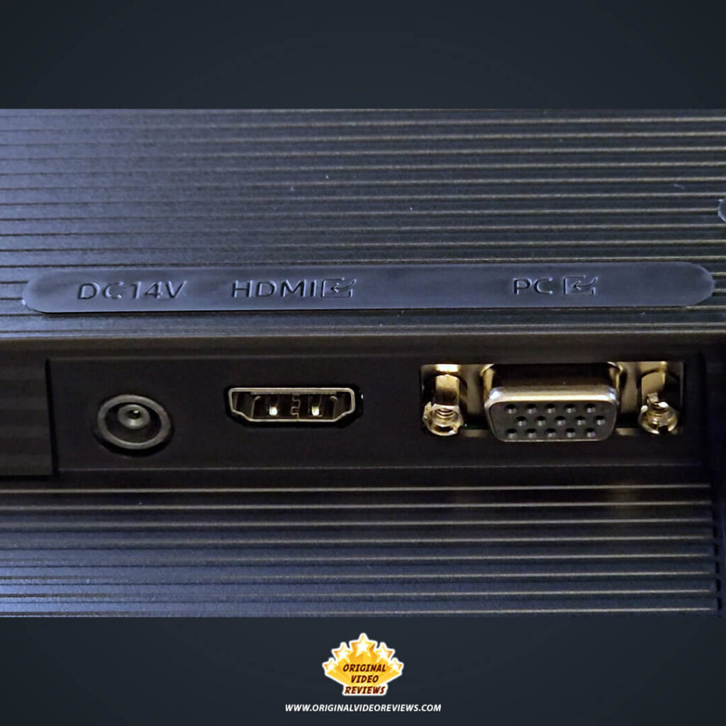 Rear input ports of the Samsung Essential Monitor S3 including DC14V power, HDMI, and VGA PC connections.