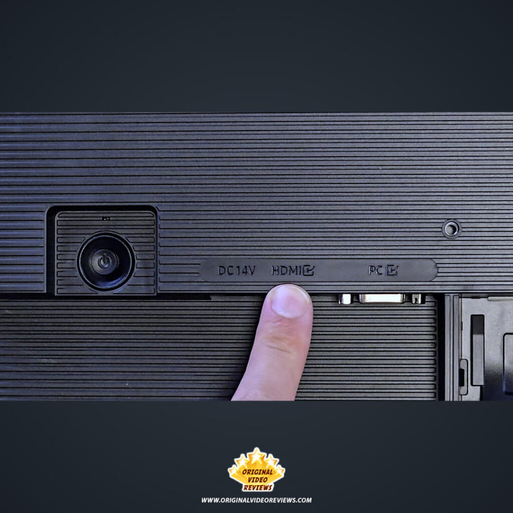 The OVR Guy pointing to the HDMI input on the rear panel of the Samsung Essential Monitor S3 next to the power and VGA ports.