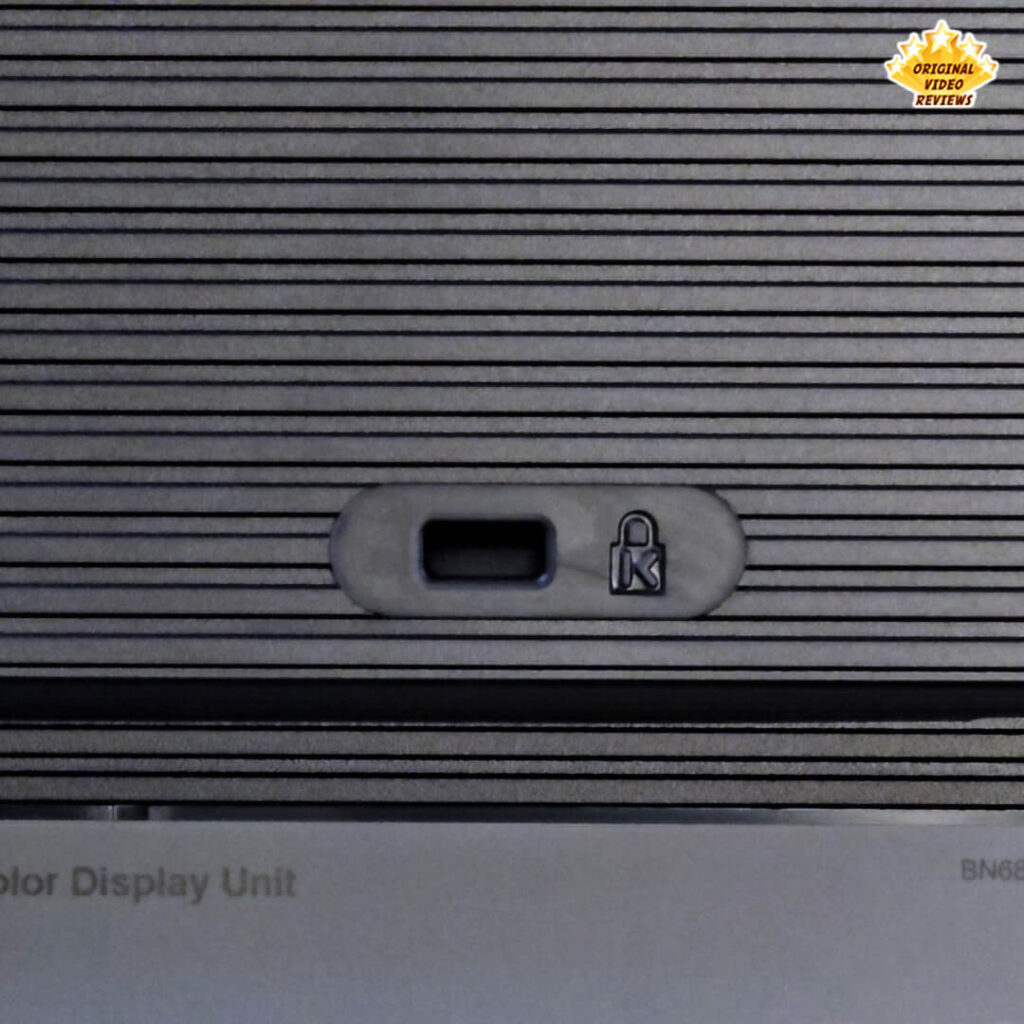 Close-up of the Kensington security lock slot on the textured rear panel of the Samsung Essential Monitor S3.
