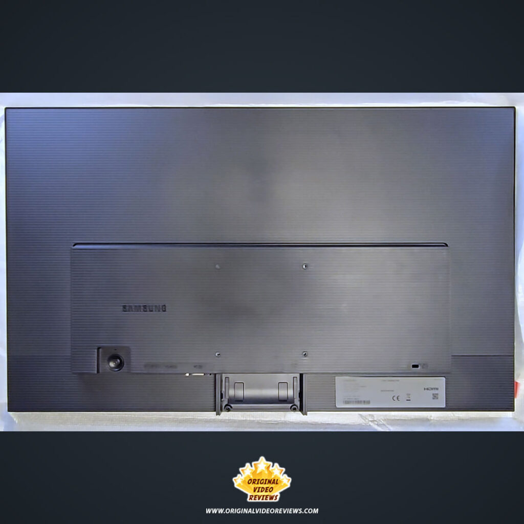 Full overview of the Samsung Essential Monitor S3 rear panel showing the textured finish, VESA mount points, and port layout.