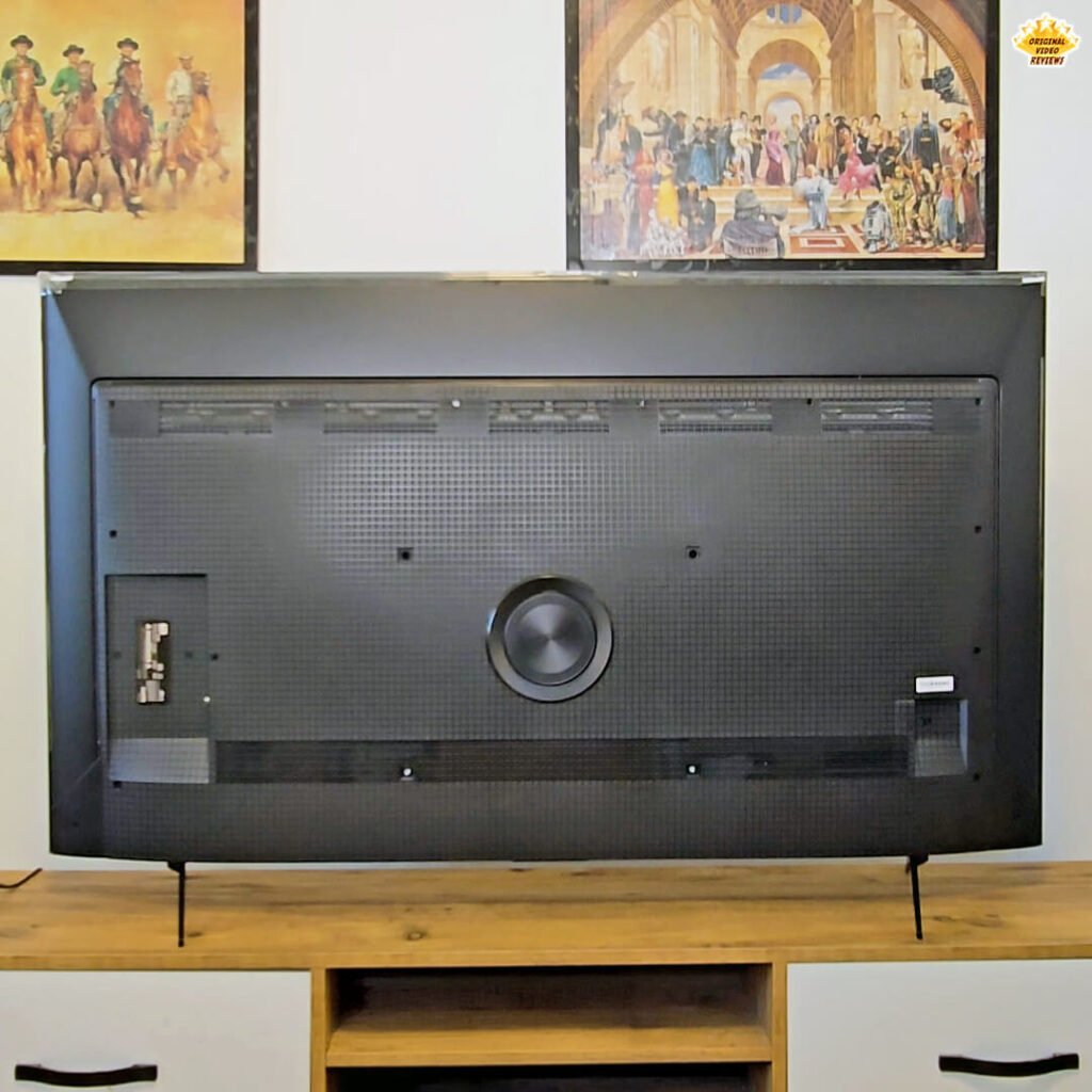 Rear view of the TCL P89K 65-inch 4K QLED TV showcasing the built-in subwoofer and port layout, part of a comprehensive review by Original Video Reviews.