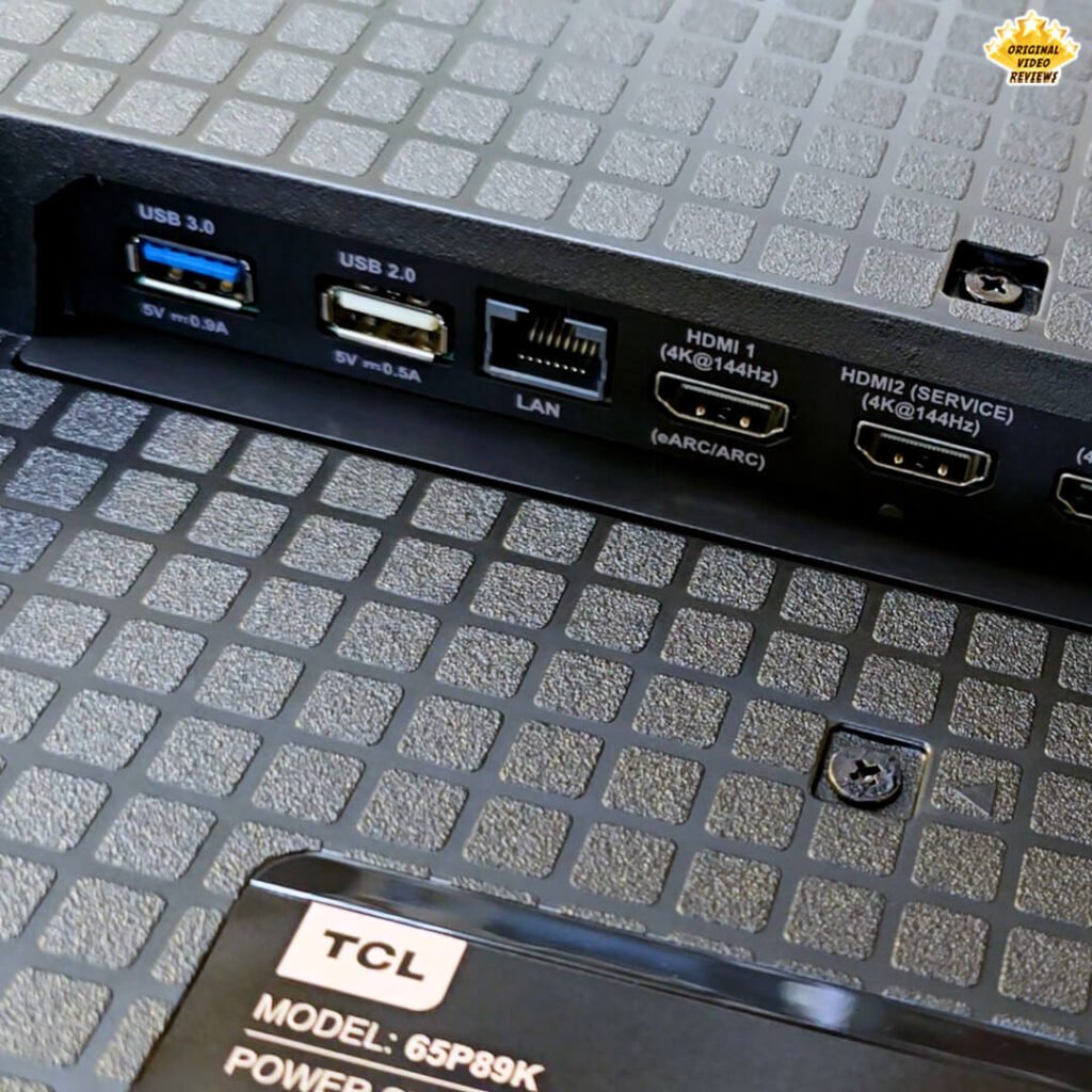 Close-up of high-speed connectivity ports on the TCL P89K 65-inch 4K QLED TV, highlighting USB 3.0 and HDMI 2.1 with 144Hz support, from a review by Original Video Reviews.