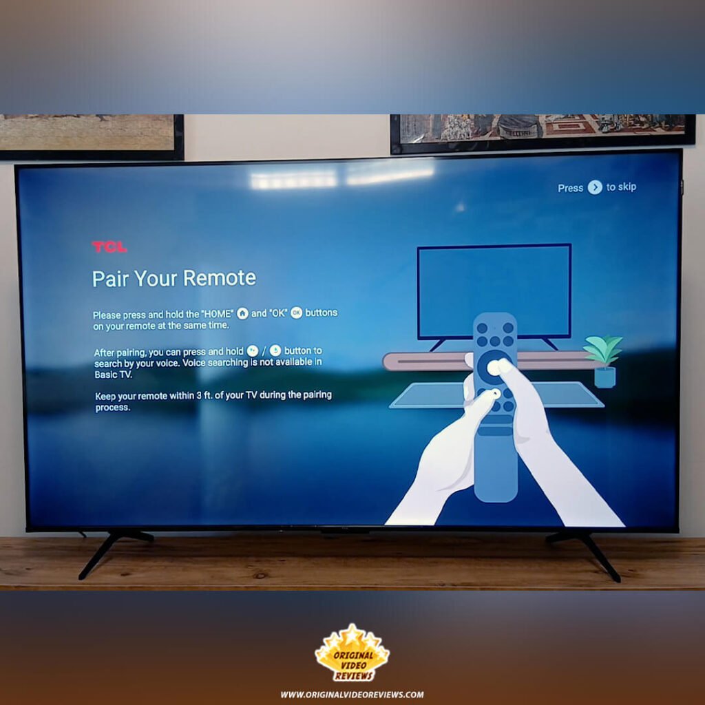 "Pair Your Remote" instruction screen on the TCL P89K 65-inch QLED TV during the initial Google TV setup, part of a review by Original Video Reviews.