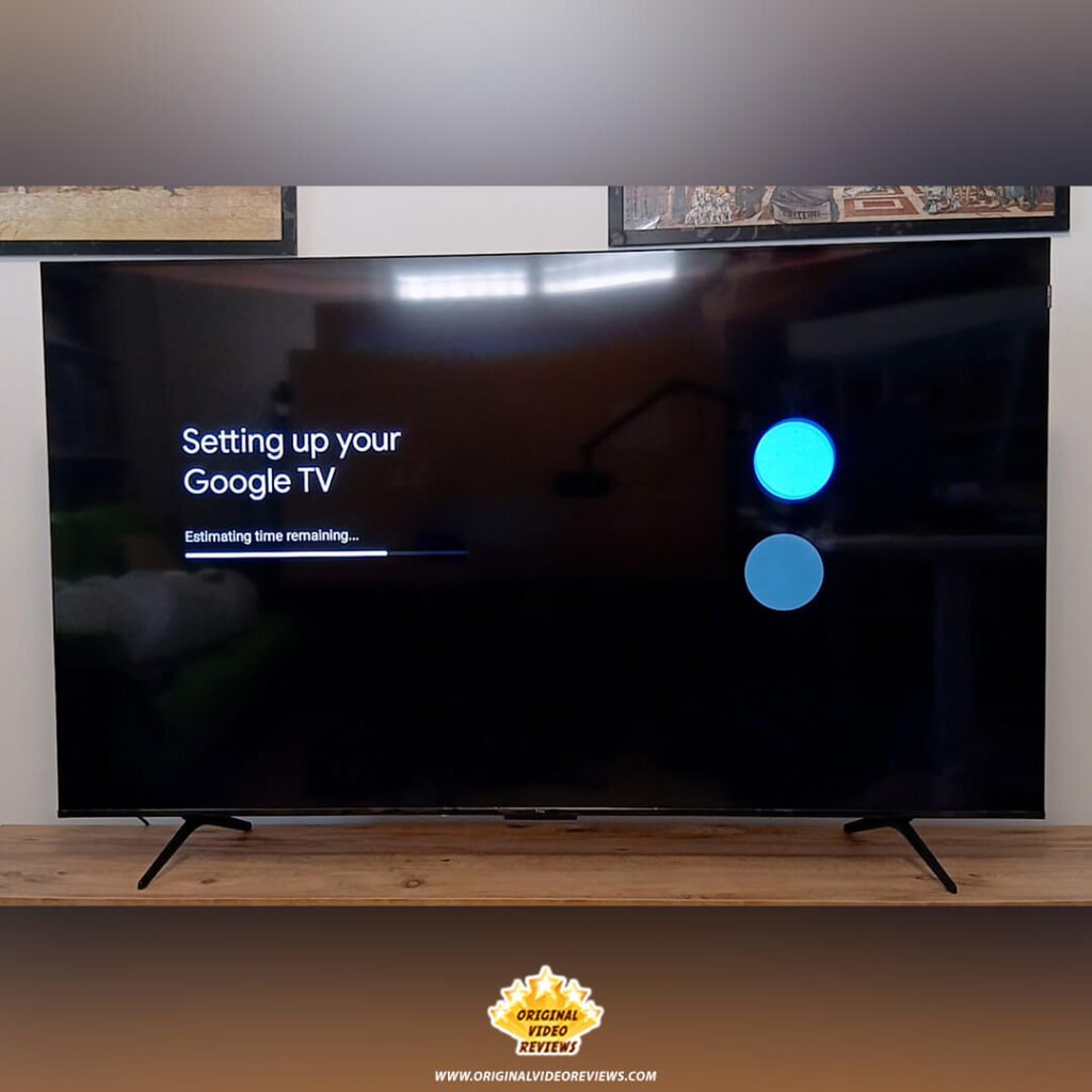 "Setting up your Google TV" progress screen on the TCL P89K 65-inch 4K QLED TV, showing the loading animation during the final configuration phase for Original Video Reviews.