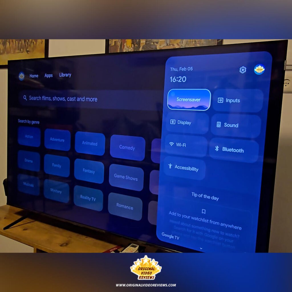 The Google TV side dashboard on the TCL P89K 65-inch QLED TV showing quick settings like Screensaver, Inputs, and Wi-Fi, with the "Search by genre" library in the background, from a review by Original Video Reviews.
