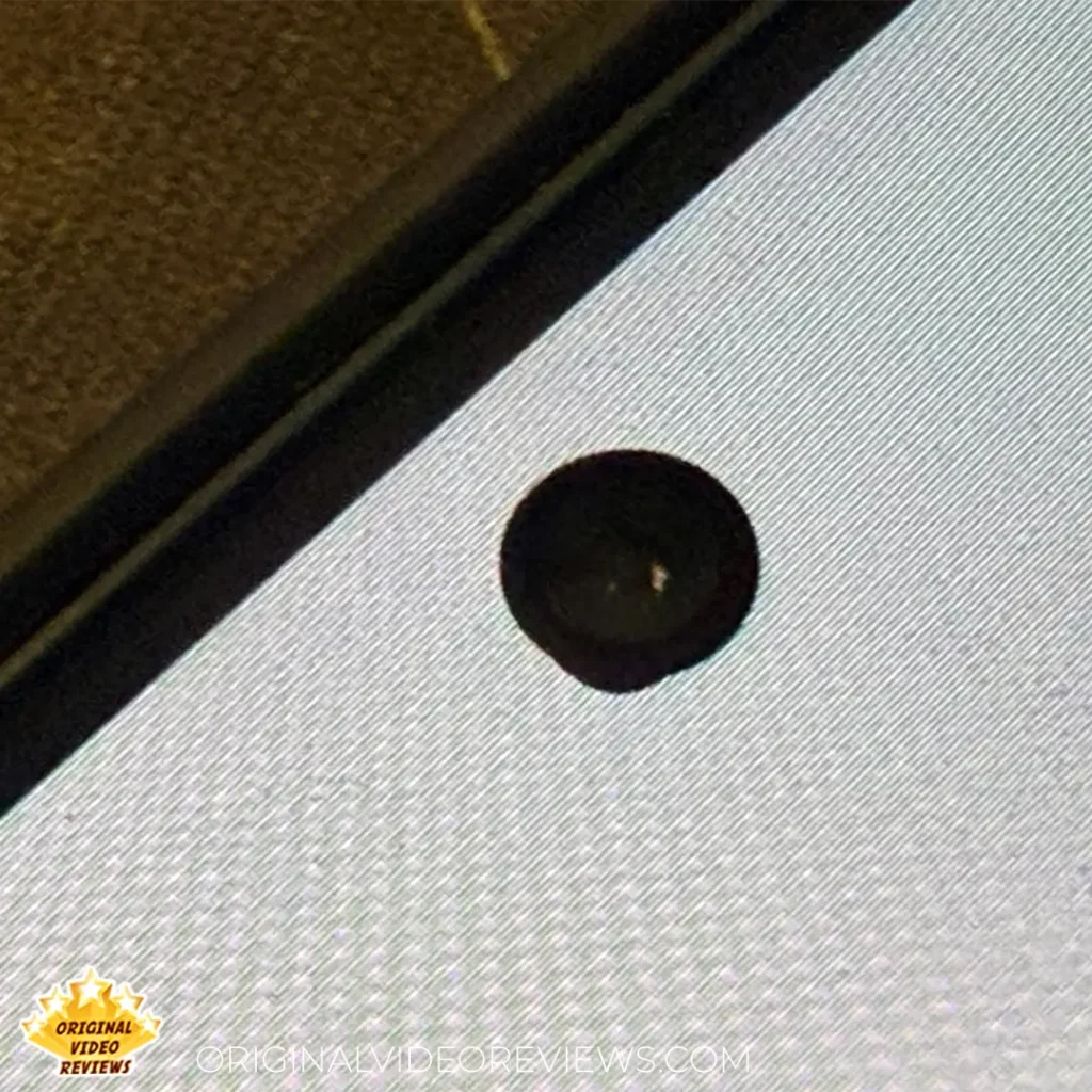 Samsung Galaxy S26 Ultra review - zoomed-in view of the front camera dead pixel defect on the outer ring
