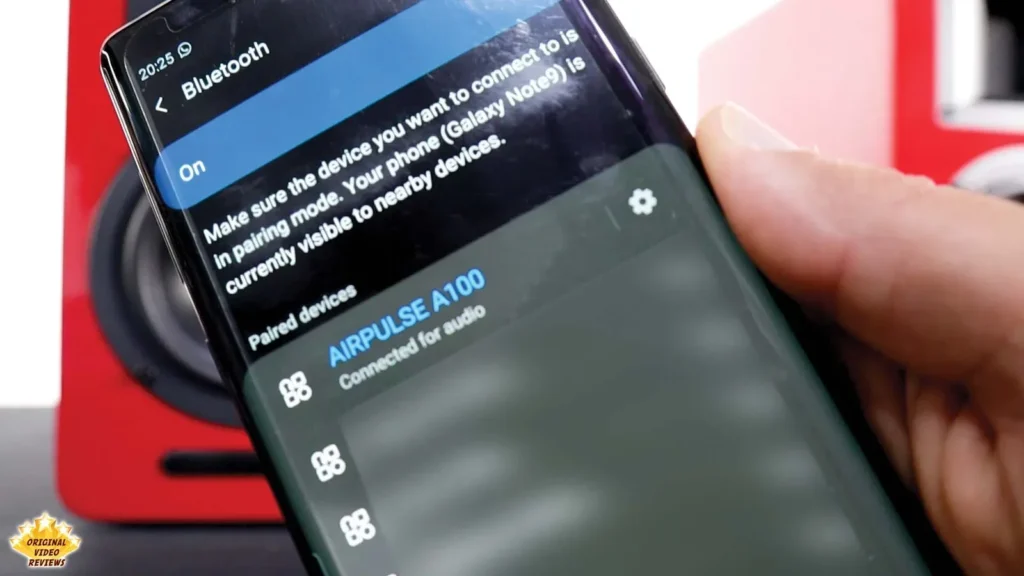 Phone showing AIRPULSE A100 as a paired device connected for audio