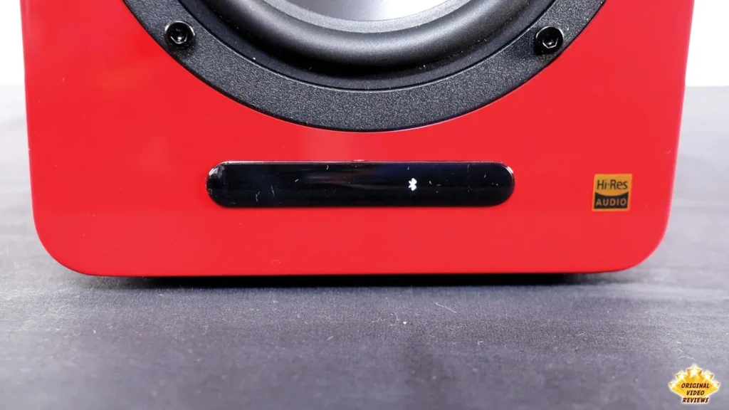 Small front panel slot and Hi-Res Audio logo below the woofer of the AIRPULSE A100