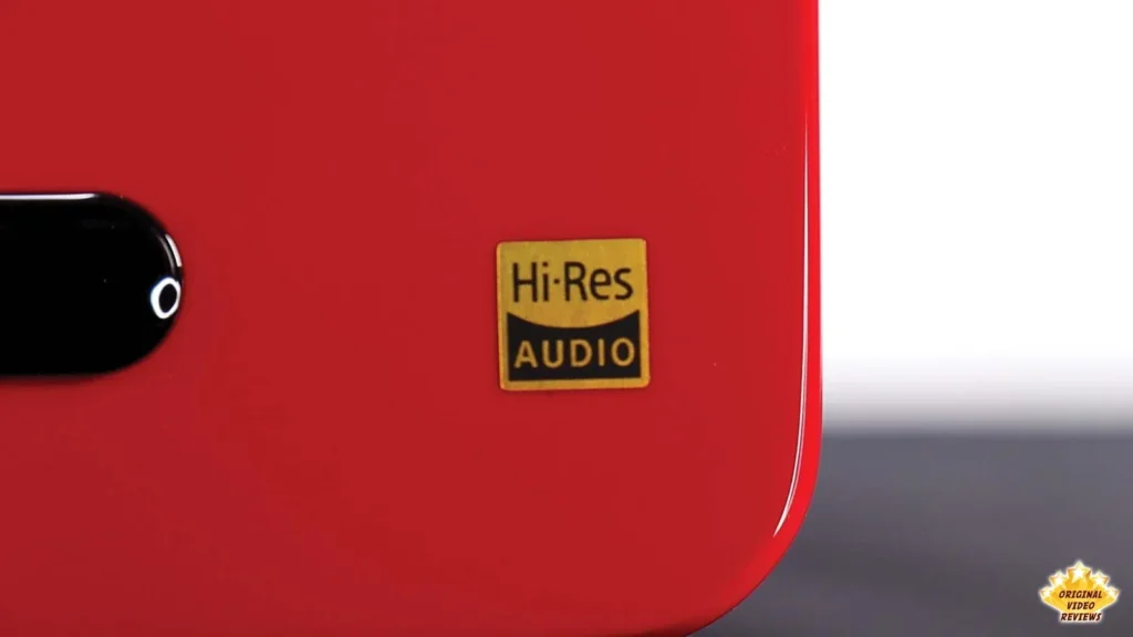 Hi-Res Audio logo on the side of a red AIRPULSE A100 speaker