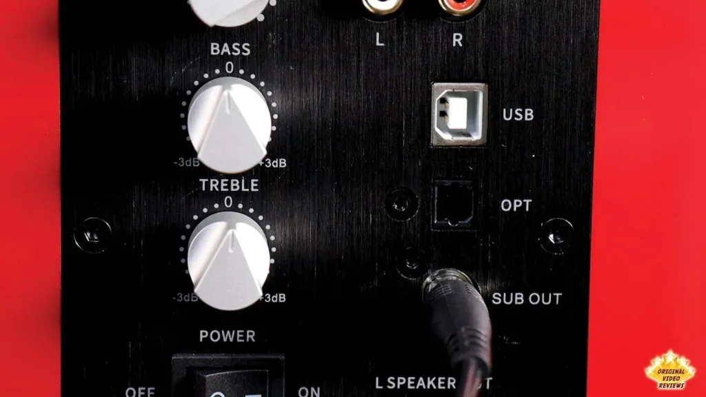 Rear panel of the AIRPULSE A100 showing the bass and treble knobs, USB, optical and sub out