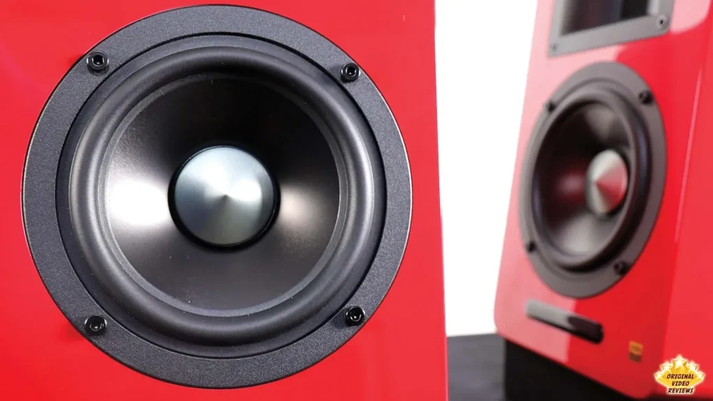 AIRPULSE A100 woofer with the second red speaker visible in the background