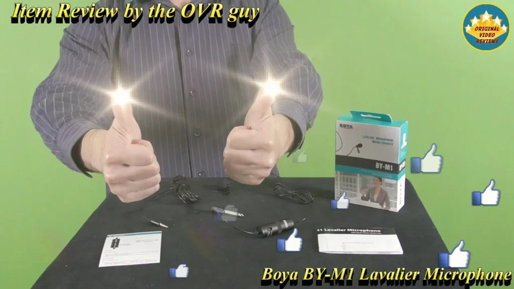 The OVR Guy giving a thumbs up next to the BOYA BY-M1 Lavalier Microphone retail box