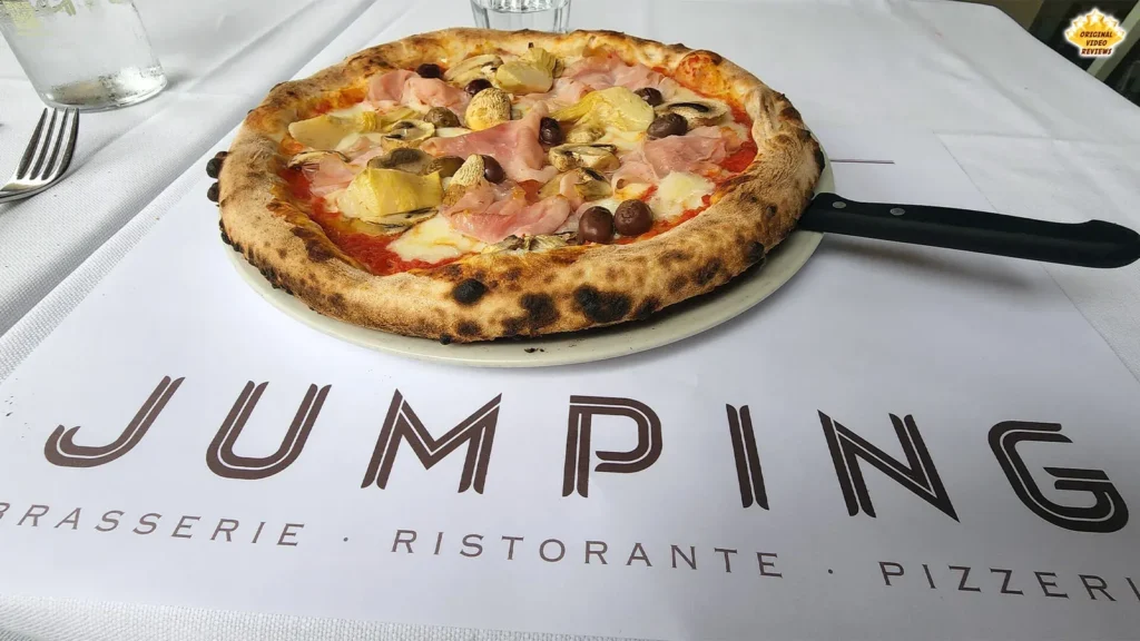 Pizza with bacon, artichoke, olives and mozzarella at Ristorante Jumping (Jumping da Gigi) in Milan